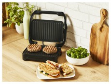 Tefal GC270D10 Inicio Compact sz&uuml;rke-fekete kontaktgrill Konyhai term&eacute;kek - Konyhai kisg&eacute;p (s&uuml;t&eacute;s / főz&eacute;s / hűt&eacute;s / &eacute;telk&eacute;sz&iacute;t&eacute;s) - Kontakt grill s&uuml;tő / s&uuml;tőlap - 501363